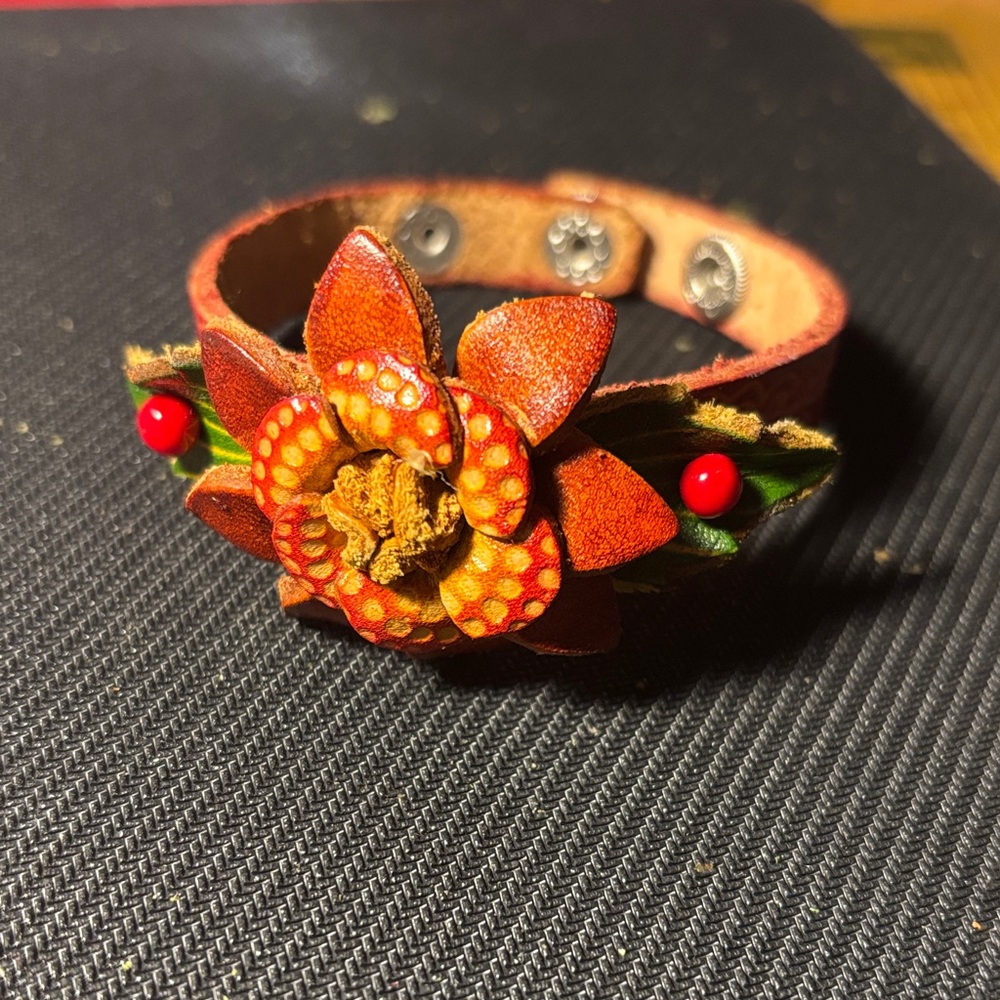 Floral Leather Bracelet with Red Accents